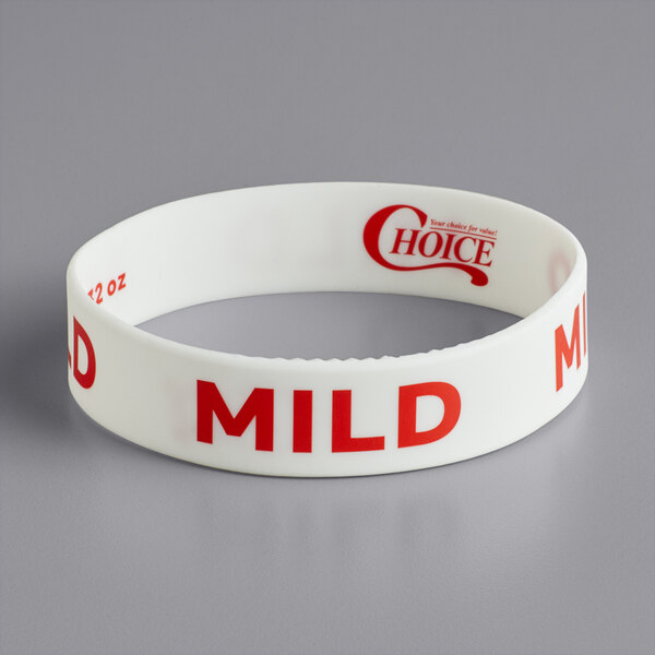 A white rubber wristband with red text that says "Mild"