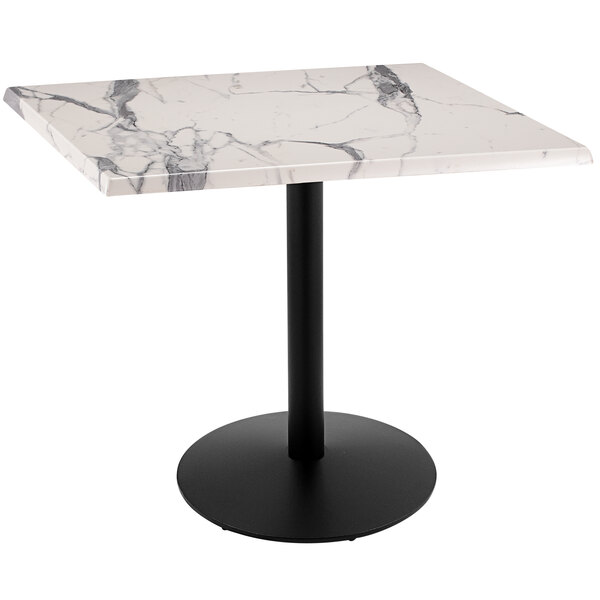 A white marble table with a black base.