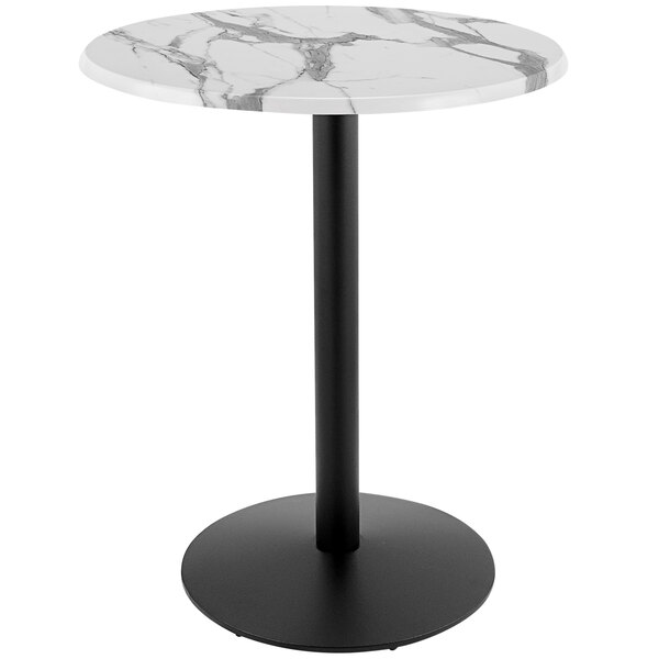 A Holland Bar Stool white marble round bar height table with black round base.