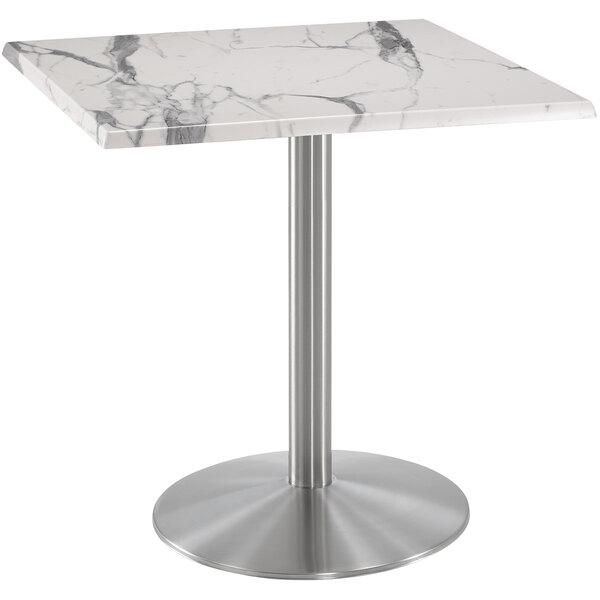 a white marble table with silver metal base
