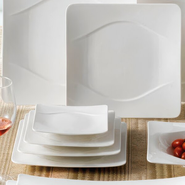 A group of CAC Modern New Bone White Square Porcelain Plates.