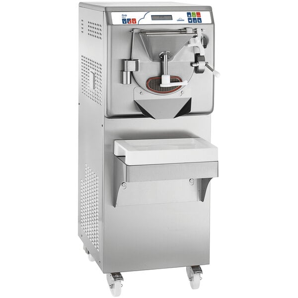 A Carpigiani water cooled ice cream batch freezer with a stainless steel base and wheels with a white handle.