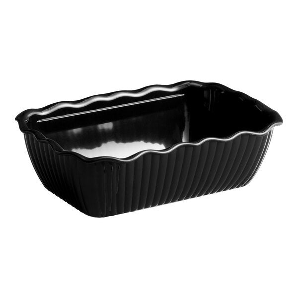 A black rectangular deli crock with fluted sides and a wavy rim.