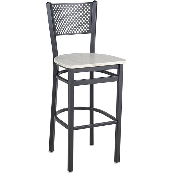 A black steel BFM barstool with a white seat.