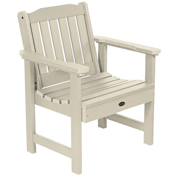A white Sequoia outdoor arm chair with faux wood accents.