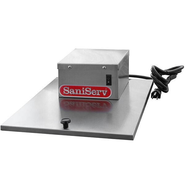 A close-up of a box for a SaniServ Auto Fill Kit on a table.