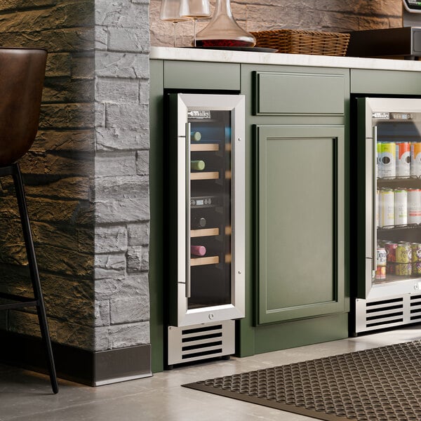 A dual temperature full glass door commercial wine cooler with multiple shelves for wine storage, built into a kitchen cabinet.
