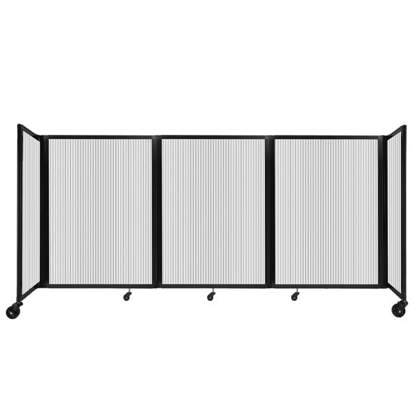 A clear polycarbonate room divider with black frame.