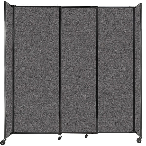 A Versare charcoal gray StraightWall sliding room divider with wheels.