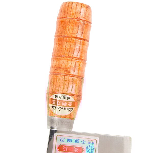 A Thunder Group stainless steel cleaver with a wooden handle.