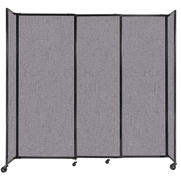 A Versare Cloud Gray StraightWall sliding room divider with black frame and wheels.