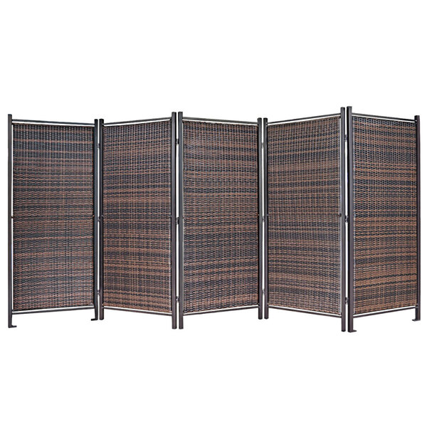 A close-up of a brown wicker partition with black accents.