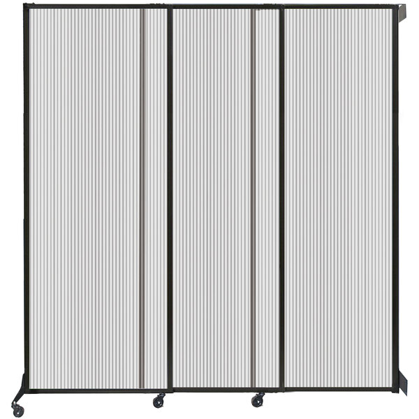 A clear poly wall-mounted sliding room divider with black metal frames.