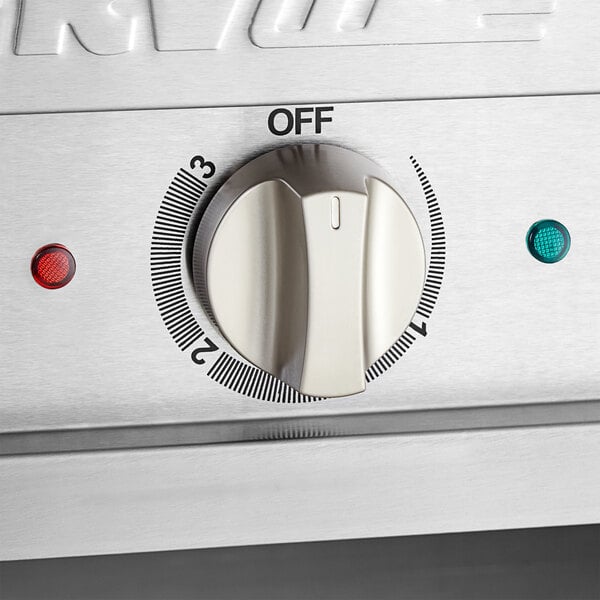 A dial on a ServIt electric steam table.