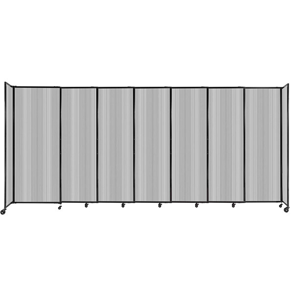 A Versare clear poly room divider with wheels.