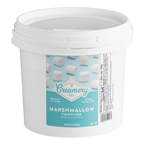 A large white plastic tub of Creamery Ave. ready-to-use marshmallow dessert and sundae topping weighing 11 pounds.