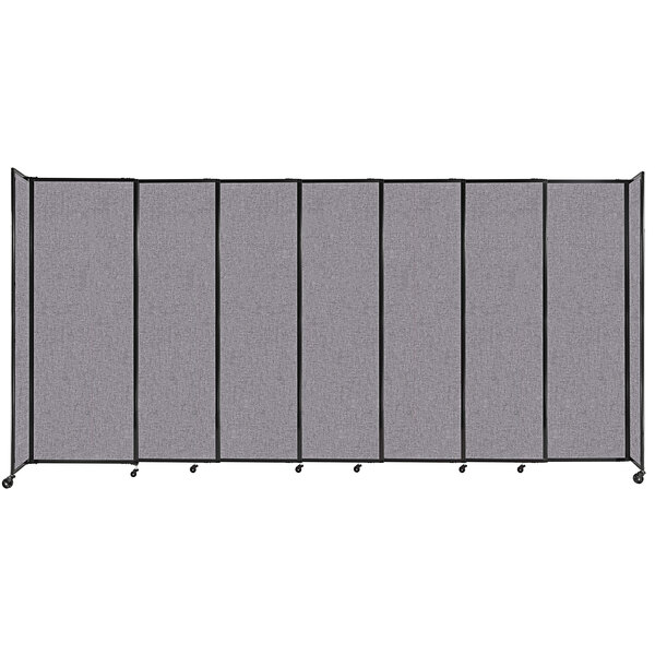 A Versare Cloud Gray StraightWall sliding room divider with black trim.