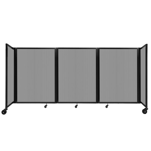 A light gray polycarbonate Versare room divider with three panels on wheels.