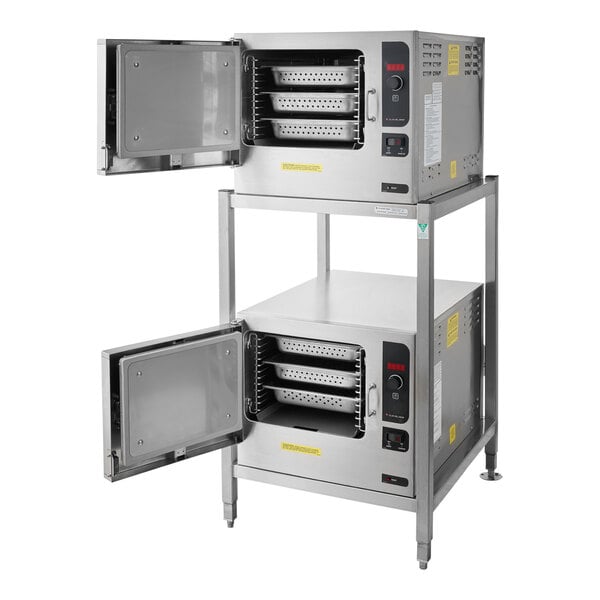 Two Cleveland SteamChef double deck electric steamers with open doors.
