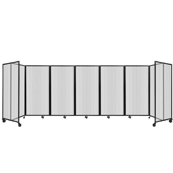 A clear polycarbonate Versare room divider with wheels.
