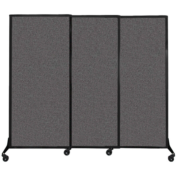 A Versare Quick-Wall sliding room divider with three panels on wheels.