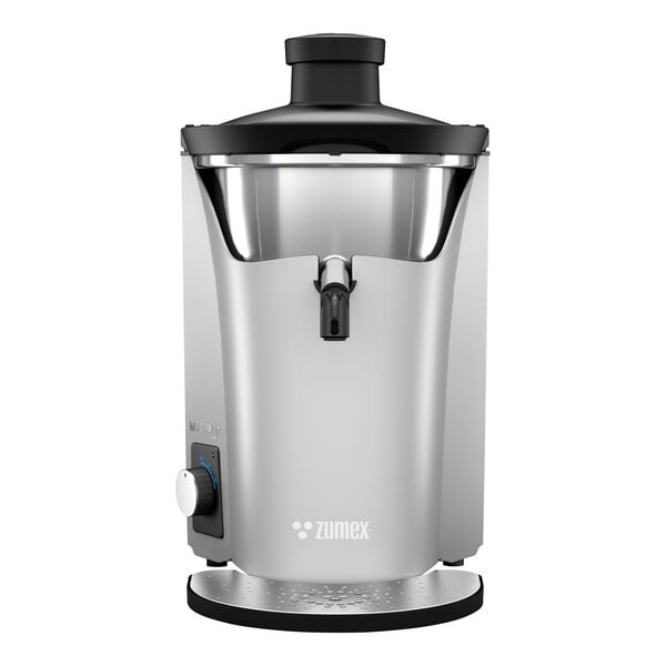 A silver Zumex Multifruit juice extractor with a black lid.