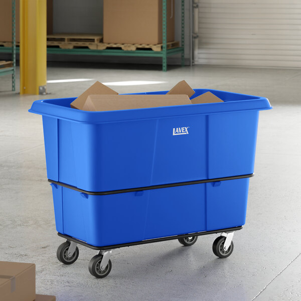 A large blue Lavex cube truck with a 27 cubic foot capacity and four caster wheels, used for transporting materials.