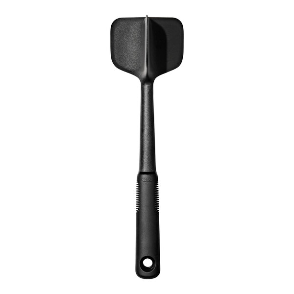 An OXO black nylon chopper/turner with a handle.