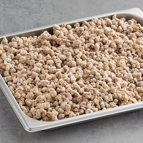 A white tray with Beyond Meat Italian Sausage Crumbles on a table.