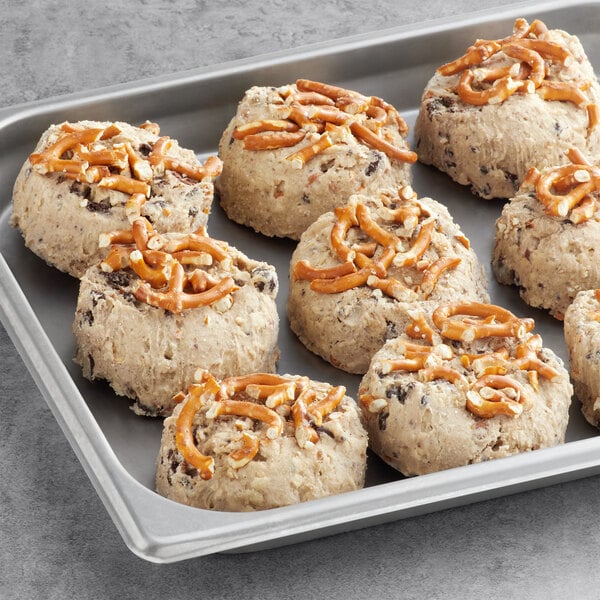 A tray of David's Cookies Decadent Chaos cookie dough with pretzels on top.