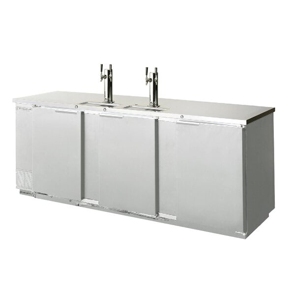 A stainless steel Beverage-Air wine dispenser with triple taps.