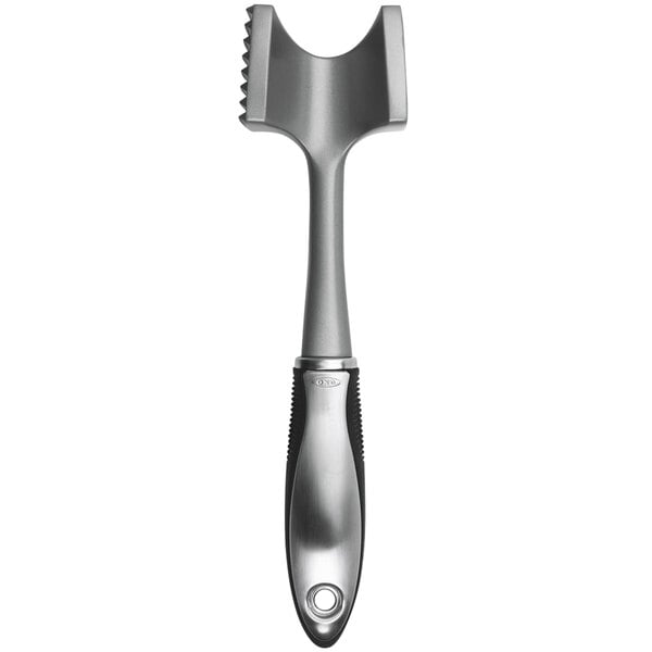 An OXO SteeL meat tenderizer with a grey and black handle.