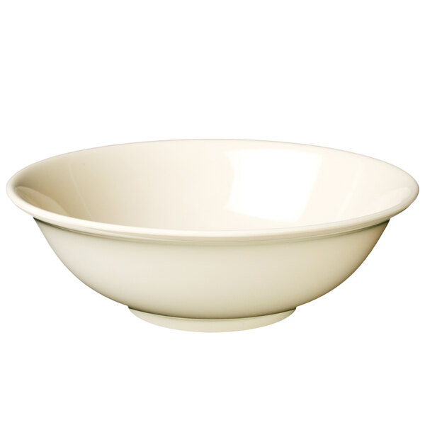 A tan Thunder Group Nustone rimless melamine bowl.