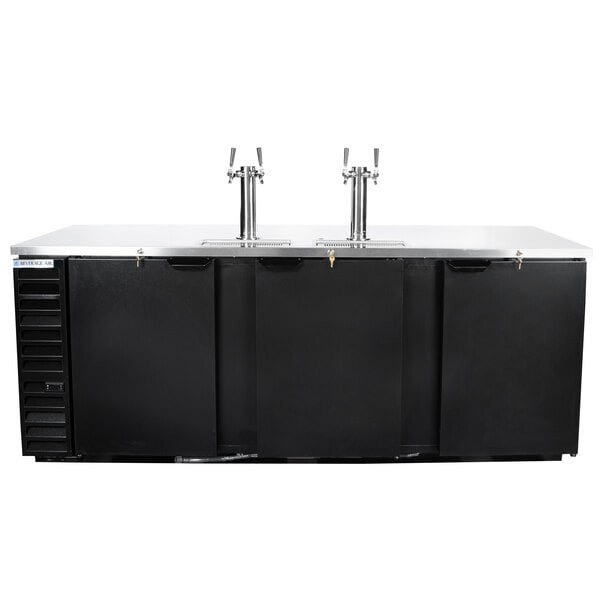 A black cabinet with a black and silver top with two keg taps.