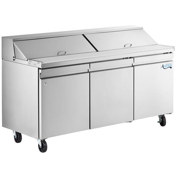 An Avantco stainless steel three door sandwich and salad prep table.