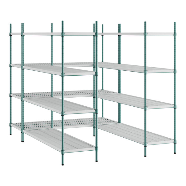 A white wire shelving unit with green metal shelves and drop mat liners.