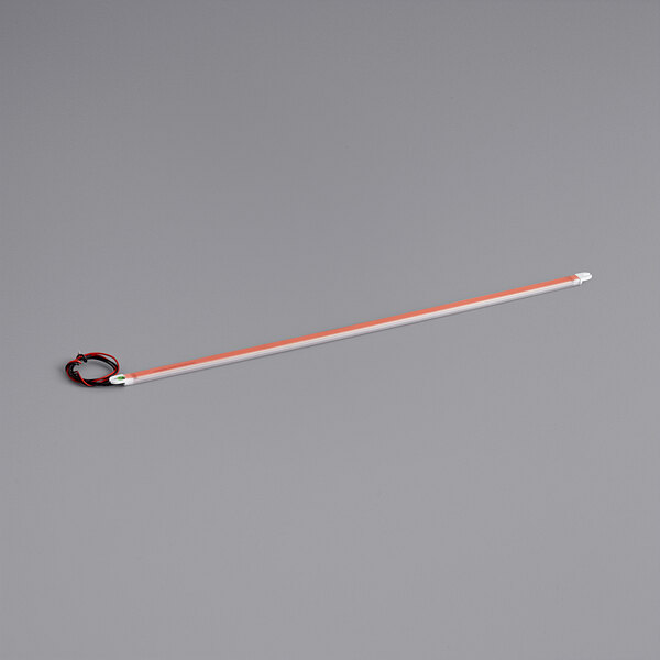 An orange and white LED light with a red and black cable and white tag.