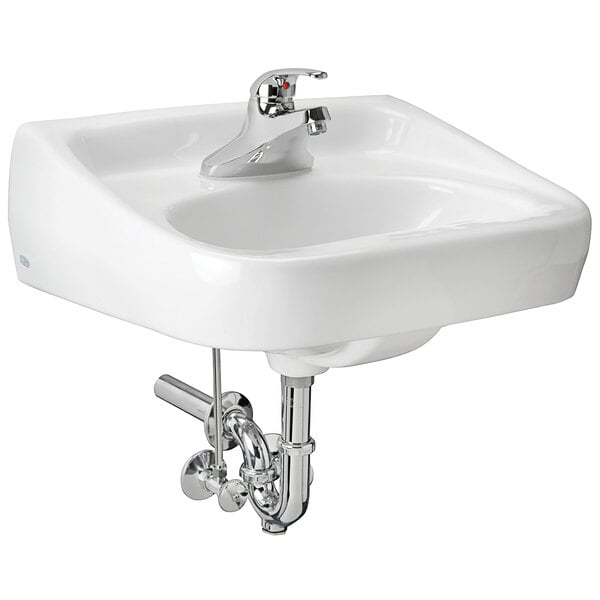 A Zurn wall hung white lavatory sink with a silver faucet.