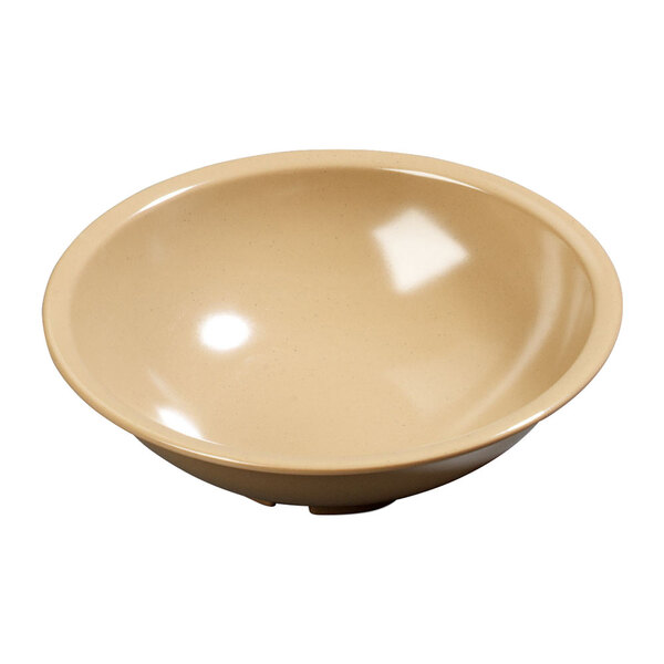 A close-up of a Carlisle maple melamine salad bowl.