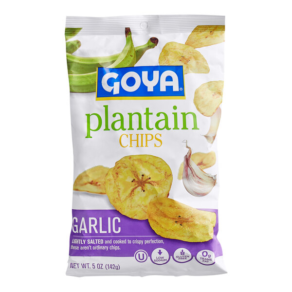 A bag of Goya plantain chips with garlic flavor, featuring images of plantain chips, green plantains, and garlic cloves on the packaging.