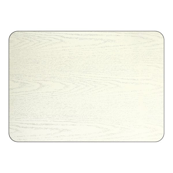 A rectangular reversible laminated table top with a white birch and ash wood grain finish.