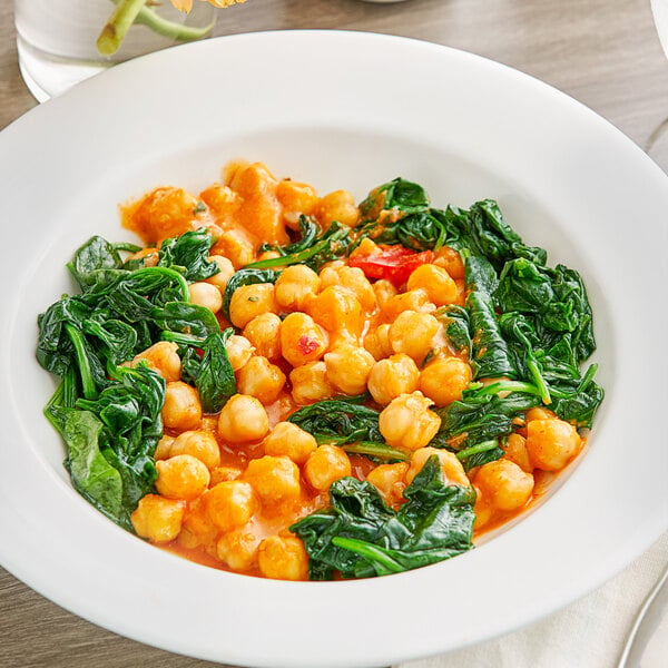 A bowl of chickpeas in a bowl of food.