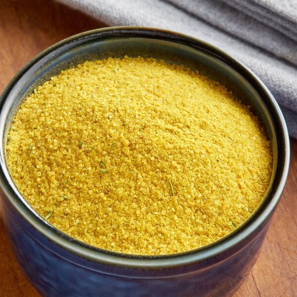 A bowl of yellow powder.