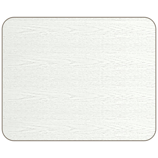 A white wood rectangular table top with a brown border.