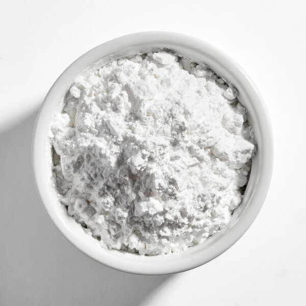 A white ceramic bowl filled with yuca harina tapioca starch.