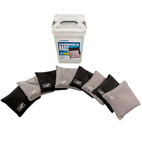 A box of black and gray Triumph bean bags next to a clear container.