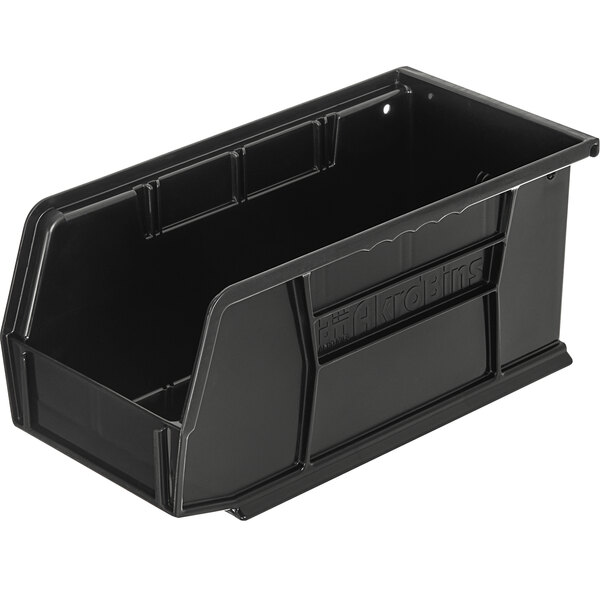 A black plastic Carlisle condiment bin with a handle.