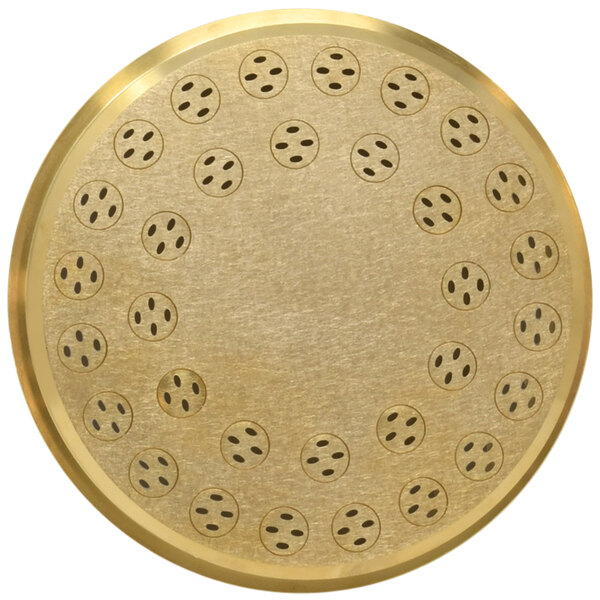 a circular gold plate with holes in it