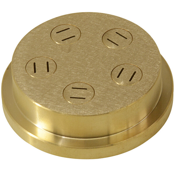 A gold circular brass disc with holes in it.