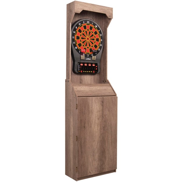 An Arachnid dart board in a rustic wooden cabinet.